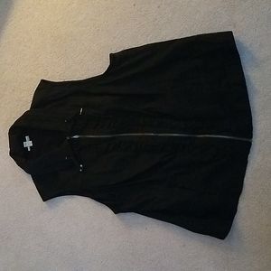 Black cotton vest w/front rouching detail, exposed zipper and side slash pocket.